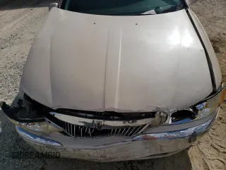 2001 Lincoln Continental with VIN 1LNHM97V01Y649261, listed as a Copart auction lot 44756395 with 141,648 mi miles and Salvage Title. Bid and sale history available at carsss.com. Image 12.