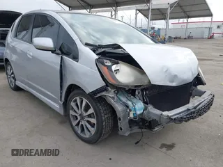 2013 Honda Fit Sport with VIN JHMGE8H58DC003021, listed as a IAAI auction lot 42120318 with 233,056 mi miles. Bid and sale history available at carsss.com. Image 1.