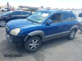 2005 Hyundai Tucson GLS with VIN KM8JN12D45U132721, listed as a IAAI auction lot 42213518 with 153,491 mi miles. Bid and sale history available at carsss.com. Image 13.