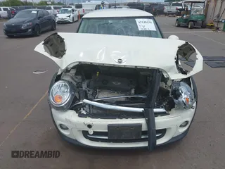 2012 MINI Hardtop with VIN WMWSU3C54CT262450, listed as a IAAI auction lot 42148430 with 55,250 mi miles and . Bid and sale history available at DreamBid. Image 6.