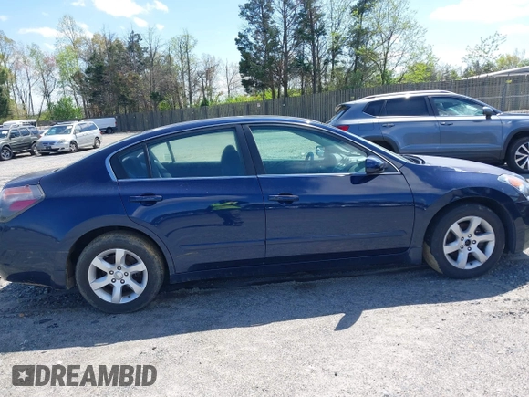 2009 Nissan Altima S with VIN 1N4AL21E59N444885, listed as a IAAI auction lot 41952567 with 185,115 mi miles and . Bid and sale history available at DreamBid. Image 14.