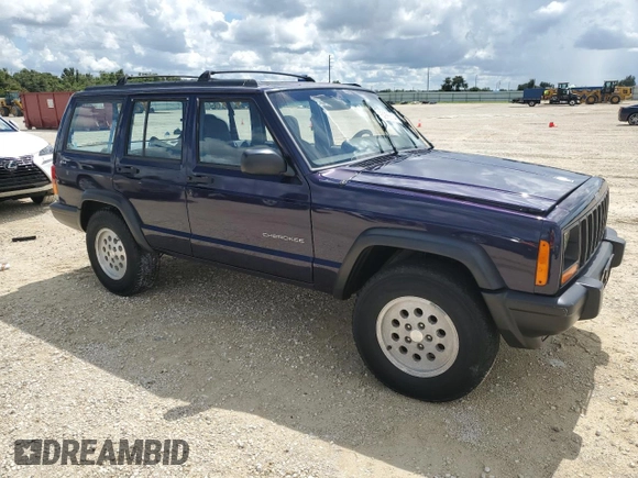 1998 Jeep Cherokee Sport with VIN 1J4FJ68S1WL149793, listed as a Copart auction lot 73976814 with 0 mi miles and Salvage Title. Bid and sale history available at carsss.com. Image 4.