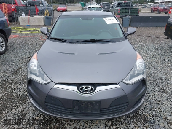 2012 Hyundai Veloster w/Gray Int z VIN KMHTC6AD7CU037130, wystawiony jako IAAI lot #41778588 z przebiegiem 125 549 mil mil oraz . Historia ofert i sprzedaży dostępna na DreamBid. Obrazek 12.