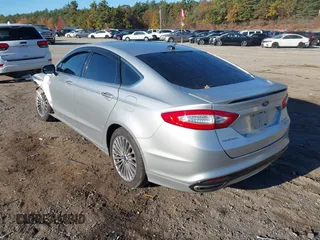 2016 Ford Fusion Titanium with VIN 3FA6P0K9XGR100723, listed as a IAAI auction lot 40627172 with 1 mi miles. Bid and sale history available at carsss.com. Image 3.