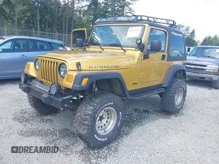 2003 Jeep Wrangler Rubicon with VIN 1J4FA69S93P302102, listed as a IAAI auction lot 42312951 with 146,408 mi miles and . Bid and sale history available at DreamBid. Image 18.