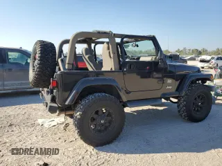 2004 Jeep Wrangler Sahara with VIN 1J4FA59S04P772756, listed as a Copart auction lot 47973495 with 92,685 mi miles and Salvage Title. Bid and sale history available at DreamBid. Image 3.