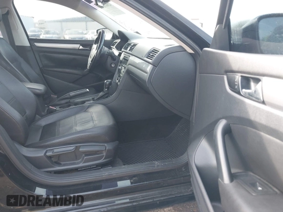 2014 Volkswagen Passat Wolfsburg Edition with VIN 1VWAS7A35EC094900, listed as a IAAI auction lot 42061090 with 115,897 mi miles and . Bid and sale history available at DreamBid. Image 5.