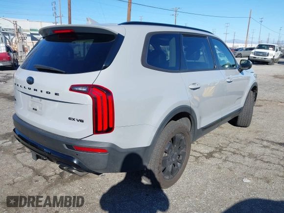 2021 Kia Telluride EX with VIN 5XYP3DHC5MG137169, listed as a IAAI auction lot 41635390 with 75,337 mi miles and . Bid and sale history available at DreamBid. Image 4.