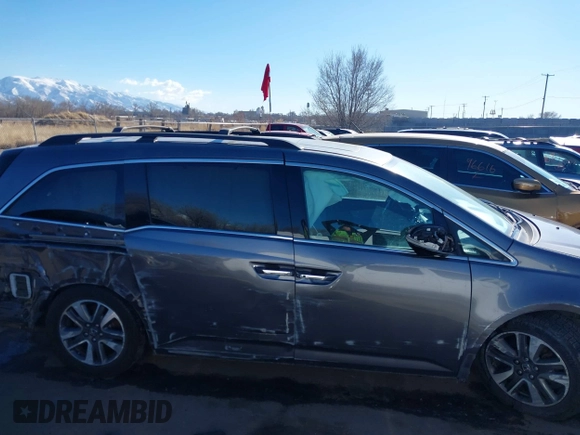 2015 Honda Odyssey Touring Elite with VIN 5FNRL5H98FB024958, listed as a IAAI auction lot 41361558 with 212,806 mi miles and . Bid and sale history available at DreamBid. Image 14.