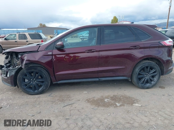 2021 Ford Edge SEL z VIN 2FMPK4J9XMBA59022, wystawiony jako IAAI lot #40596255 z przebiegiem 41 770 mil mil oraz . Historia ofert i sprzedaży dostępna na DreamBid. Obrazek 14.
