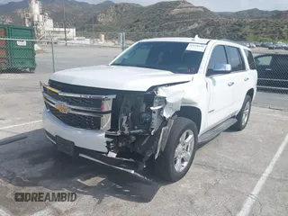 2015 Chevrolet Tahoe LS с VIN 1GNSCAEC7FR737717, выставлен на аукционе IAAI как лот 42110150 с пробегом 125 633 миль миль и . История ставок и продаж доступна на DreamBid. Изображение 2.