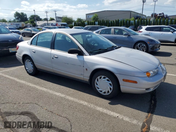 2000 Saturn SL z VIN 1G8ZK5279YZ252761, wystawiony jako Copart lot #63204475 z przebiegiem 80 646 mil mil oraz Czysty tytuł • Clean title. Historia ofert i sprzedaży dostępna na DreamBid. Obrazek 4.