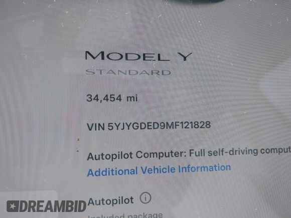 2021 Tesla Model Y Standard Range with VIN 5YJYGDED9MF121828, listed as a IAAI auction lot 42119518 with 34,454 mi miles and . Bid and sale history available at carsss.com. Image 14.