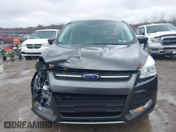 2016 Ford Escape SE with VIN 1FMCU9GXXGUC53589, listed as a IAAI auction lot 42017364 with 89,394 mi miles. Bid and sale history available at carsss.com. Image 12.