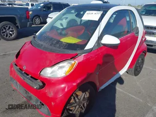 2014 Smart fortwo Pure with VIN WMEEJ3BA0EK757200, listed as a IAAI auction lot 41681977 with 99,245 mi miles and . Bid and sale history available at DreamBid. Image 2.