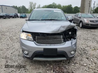 2017 Dodge Journey SXT with VIN 3C4PDCBB0HT545567, listed as a Copart auction lot 57766105 with 56,569 mi miles and Salvage title. Bid and sale history available at DreamBid. Image 5.