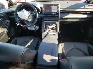 2021 Toyota Avalon Hybrid XSE z VIN 4T1EA1AB5MU007884, wystawiony jako Copart lot #76042404 z przebiegiem 188 347 mil mil oraz Szkoda całkowita • Salvage title. Historia ofert i sprzedaży dostępna na DreamBid. Obrazek 8.