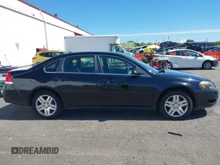2014 Chevrolet Impala LT with VIN 2G1WB5E30E1166401, listed as a IAAI auction lot 42071504 with 158,813 mi miles and . Bid and sale history available at DreamBid. Image 13.