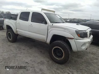 2005 Toyota Tacoma PreRunner with VIN 3TMJU62N75M001963, listed as a IAAI auction lot 41554786 with 197,000 mi miles. Bid and sale history available at carsss.com. Image 1.