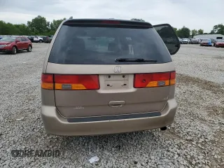 2003 Honda Odyssey EX z VIN 5FNRL186X3B152340, wystawiony jako Copart lot #57883455 z przebiegiem 214 008 mil mil oraz Szkoda całkowita • Salvage title. Historia ofert i sprzedaży dostępna na DreamBid. Obrazek 6.