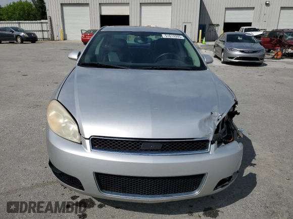 2013 Chevrolet Impala LTZ with VIN 2G1WC5E3XD1222887, listed as a Copart auction lot 51612205 with 200,526 mi miles and Salvage Title. Bid and sale history available at DreamBid. Image 5.