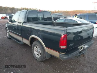 1999 Ford F-150 XL with VIN 1FTRX17L1XNB98741, listed as a IAAI auction lot 41113649 with Not Provided miles. Bid and sale history available at carsss.com. Image 3.