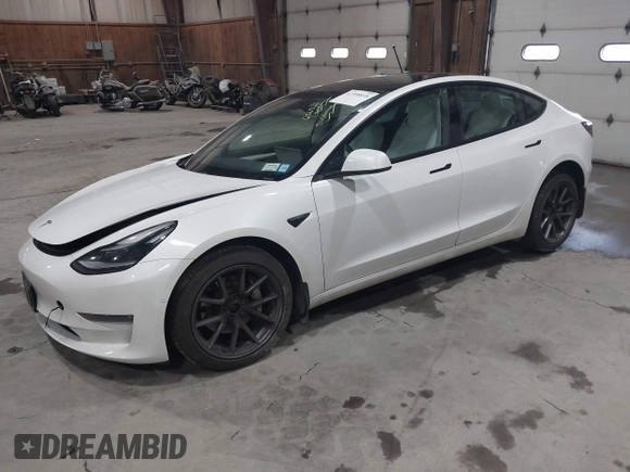 2021 Tesla Model 3 Long Range with VIN 5YJ3E1EBXMF051060, listed as a IAAI auction lot 41958018 with 65,631 mi miles. Bid and sale history available at carsss.com. Image 2.