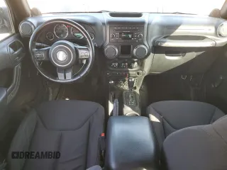 2013 Jeep Wrangler Unlimited Freedom z VIN 1C4BJWDG0DL513902, wystawiony jako Copart lot #52045975 z przebiegiem 166 827 mil mil oraz Szkoda całkowita • Salvage title. Historia ofert i sprzedaży dostępna na DreamBid. Obrazek 8.