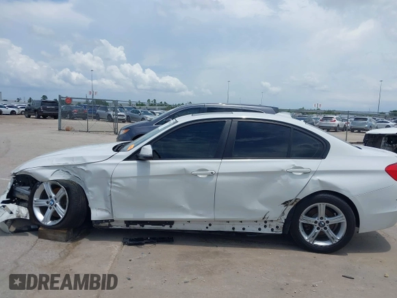 2013 BMW 3 Series 320i with VIN WBA3B1C50DK129576, listed as a IAAI auction lot 42393038 with 160,370 mi miles and . Bid and sale history available at DreamBid. Image 14.