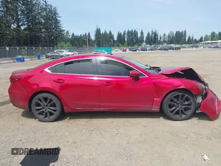 2016 Mazda 6 i Grand Touring с VIN JM1GJ1W52G1403034, выставлен на аукционе IAAI как лот 42238556 с пробегом 141 470 миль миль и . История ставок и продаж доступна на DreamBid. Изображение 13.