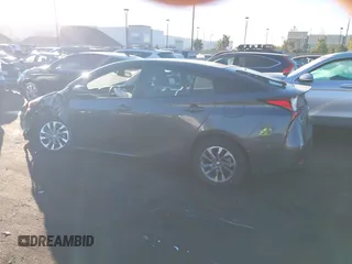 2020 Toyota Prius L Eco z VIN JTDKARFU9L3104882, wystawiony jako IAAI lot #41243035 z przebiegiem 29 013 mil mil oraz . Historia ofert i sprzedaży dostępna na DreamBid. Obrazek 15.