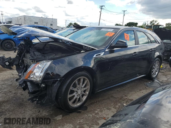 2014 Cadillac CTS with VIN 1G6DH8E3XE0134312, listed as a Copart auction lot 61556874 with 77,194 mi miles and Salvage Title. Bid and sale history available at DreamBid. Image 1.