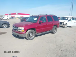 2004 Chevrolet Tahoe LS with VIN 1GNEC13T34J233824, listed as a IAAI auction lot 41877870 with 233,360 mi miles. Bid and sale history available at carsss.com. Image 2.