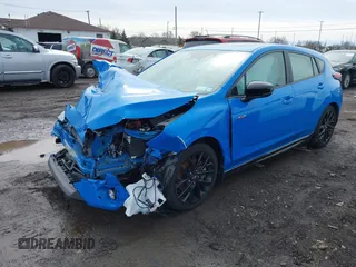 2024 Subaru Impreza RS with VIN JF1GUHJCXR8327309, listed as a IAAI auction lot 41560893 with 1,637 mi miles. Bid and sale history available at carsss.com. Image 2.