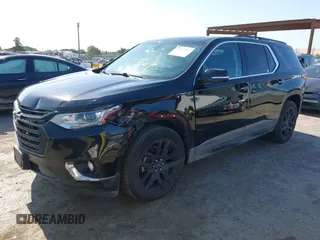 2019 Chevrolet Traverse LT Cloth z VIN 1GNEVGKW7KJ208656, wystawiony jako IAAI lot #42373422 z przebiegiem 132 863 mil mil oraz . Historia ofert i sprzedaży dostępna na DreamBid. Obrazek 18.