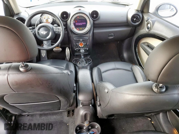 2014 MINI Countryman S with VIN WMWZC3C53EWT01161, listed as a Copart auction lot 50586965 with 151,813 mi miles and Salvage Title. Bid and sale history available at DreamBid. Image 8.