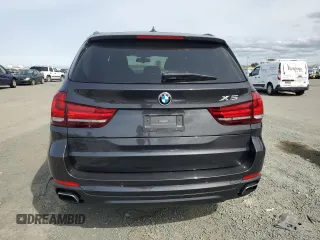 2015 BMW X5 xDrive50i z VIN 5UXKR6C5XF0J77848, wystawiony jako Copart lot #52333555 z przebiegiem 95 425 mil mil oraz Szkoda całkowita • Salvage title. Historia ofert i sprzedaży dostępna na DreamBid. Obrazek 6.