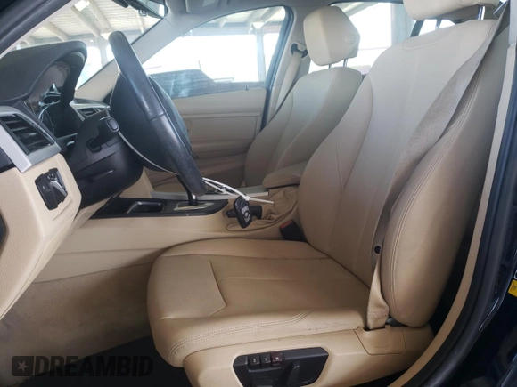 2013 BMW 3 Series 328i with VIN WBA3C1G52DNR46327, listed as a Copart auction lot 49737145 with 105,670 mi miles and Salvage Title. Bid and sale history available at DreamBid. Image 7.