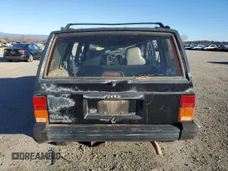 1996 Jeep Cherokee Sport with VIN 1J4FJ68SXTL274898, listed as a Copart auction lot 87676505 with 258,358 mi miles and Salvage Title. Bid and sale history available at carsss.com. Image 6.