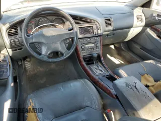 1999 Acura TL with VIN 19UUA5658XA007430, listed as a Copart auction lot 65649844 with 235,770 mi miles and Salvage Title. Bid and sale history available at carsss.com. Image 8.