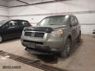2007 Honda Pilot EX-L with VIN 5FNYF18557B009179, listed as a IAAI auction lot 41952140 with 300,471 mi miles. Bid and sale history available at carsss.com. Image 6.