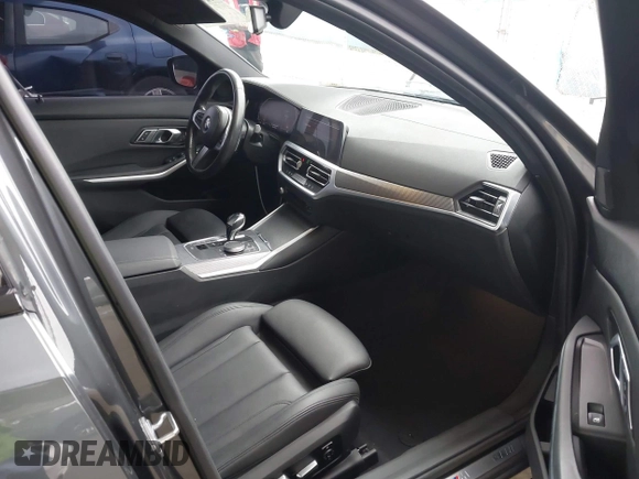 2019 BMW 3 Series 330i with VIN WBA5R1C56KAK07317, listed as a IAAI auction lot 42034264 with 43,448 mi miles and . Bid and sale history available at DreamBid. Image 5.