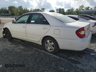 2002 Toyota Camry LE z VIN 4T1BE32K12U055722, wystawiony jako Copart lot #56522495 z przebiegiem 256 565 mil mil oraz Szkoda całkowita • Salvage title. Historia ofert i sprzedaży dostępna na DreamBid. Obrazek 2.