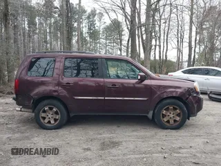 2010 Honda Pilot Touring with VIN 5FNYF4H9XAB040715, listed as a IAAI auction lot 41807334 with 262,786 mi miles and . Bid and sale history available at carsss.com. Image 14.