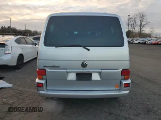 2003 Volkswagen EuroVan MV с VIN WV2MB47053H002505, выставлен на аукционе Copart как лот 83840884 с пробегом 250 786 миль миль и Чистый • Clean title. История ставок и продаж доступна на DreamBid. Изображение 6.