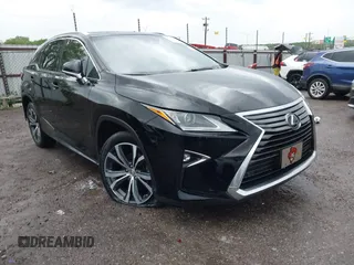 2016 Lexus RX 350 z VIN 2T2ZZMCA6GC005692, wystawiony jako IAAI lot #42147337 z przebiegiem 132 363 mil mil oraz . Historia ofert i sprzedaży dostępna na DreamBid. Obrazek 1.