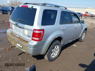 2011 Ford Escape Limited with VIN 1FMCU9EG8BKB38819, listed as a IAAI auction lot 41767666 with 127,490 mi miles. Bid and sale history available at carsss.com. Image 4.