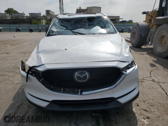 2021 Mazda CX-5 Touring with VIN JM3KFACM1M0405129, listed as a Copart auction lot 67874724 with 49,618 mi miles and Salvage Title. Bid and sale history available at carsss.com. Image 5.