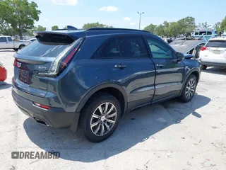 2019 Cadillac XT4 FWD Sport with VIN 1GYFZER42KF107032, listed as a IAAI auction lot 42193557 with 96,615 mi miles and . Bid and sale history available at DreamBid. Image 4.