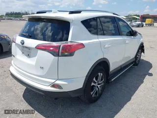 2017 Toyota RAV4 LE with VIN JTMZFREV2HJ711557, listed as a IAAI auction lot 41894094 with 167,645 mi miles. Bid and sale history available at carsss.com. Image 4.